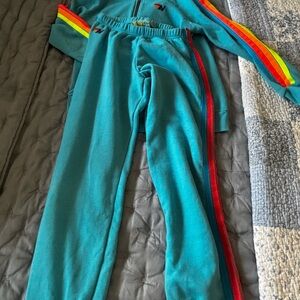 Aviator Nation Teal hoodie and sweatpants with bright neon accents.